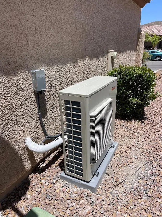 Residential air conditioning condenser unit in Waipahu